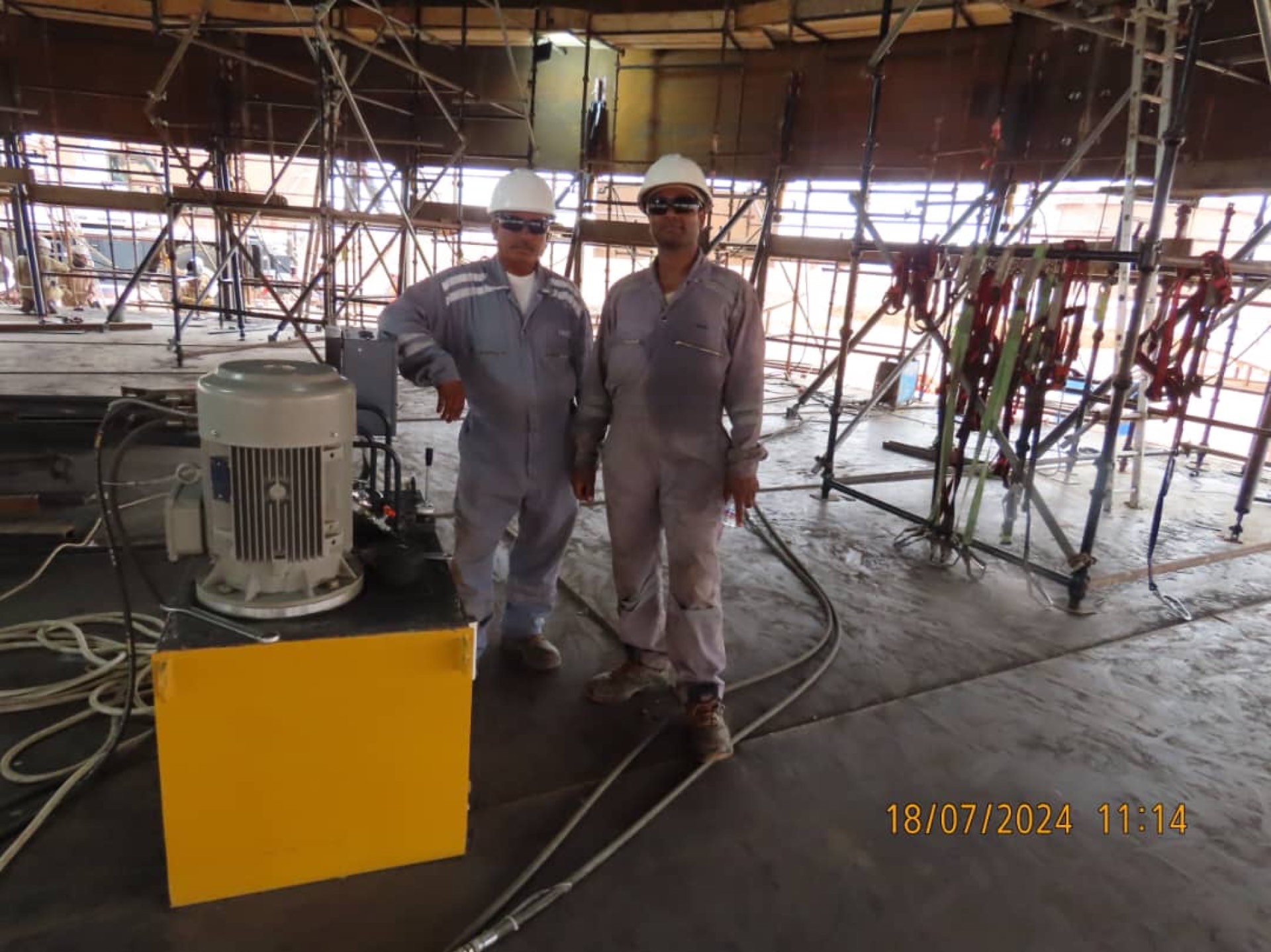 CAS crew inside tank roof